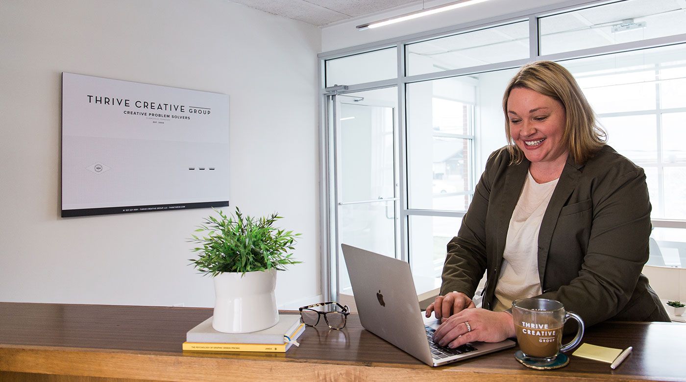 Thrive Leader Lorilee Rager Working on Laptop