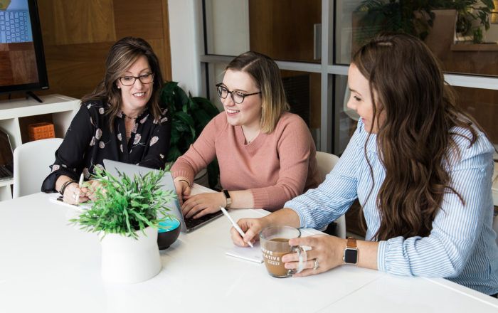 A photo of the Thrive Creative Group team working hard to help business with marketing and SEO.